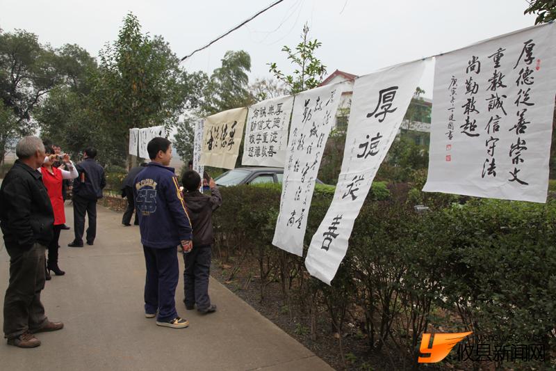 “攸县精神”现场给力挥墨