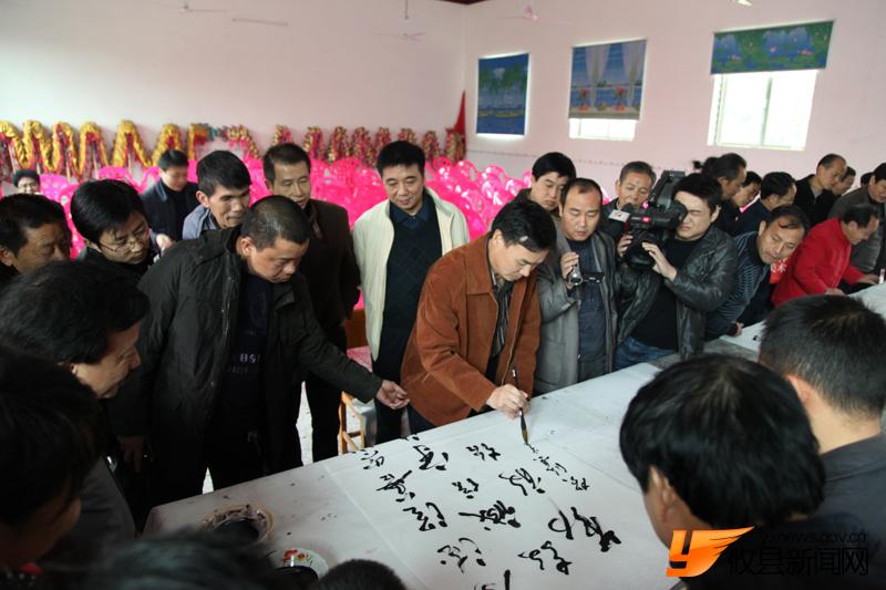 “攸县精神”现场给力挥墨