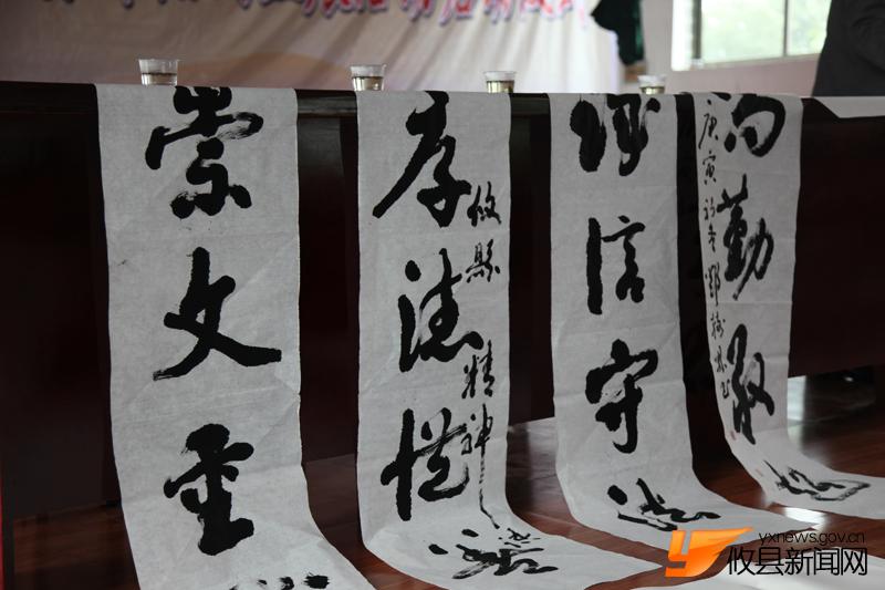 “攸县精神”现场给力挥墨