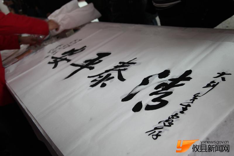 “攸县精神”现场给力挥墨