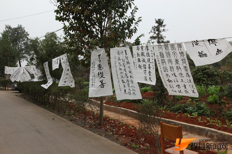 “攸县精神”现场给力挥墨