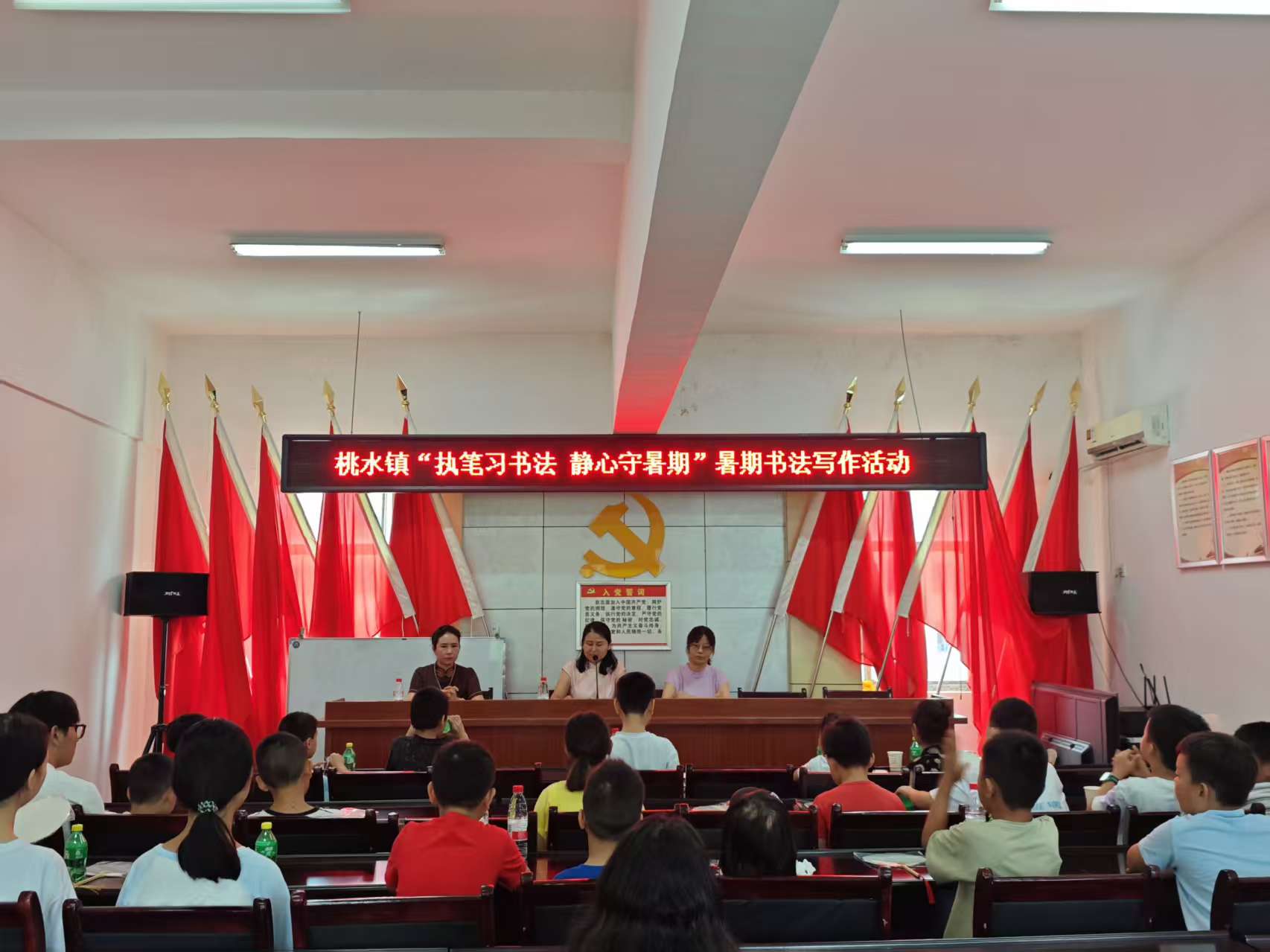 执笔习书法，静心守暑期——桃水镇开展第四期“健康伴暑期·安全记在心”儿童暑期系列活动